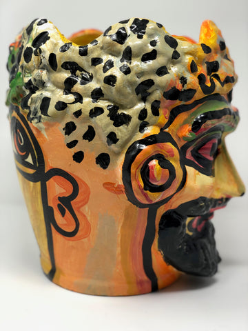 “Colorful face vase”