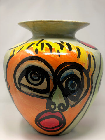 “Face on vase”